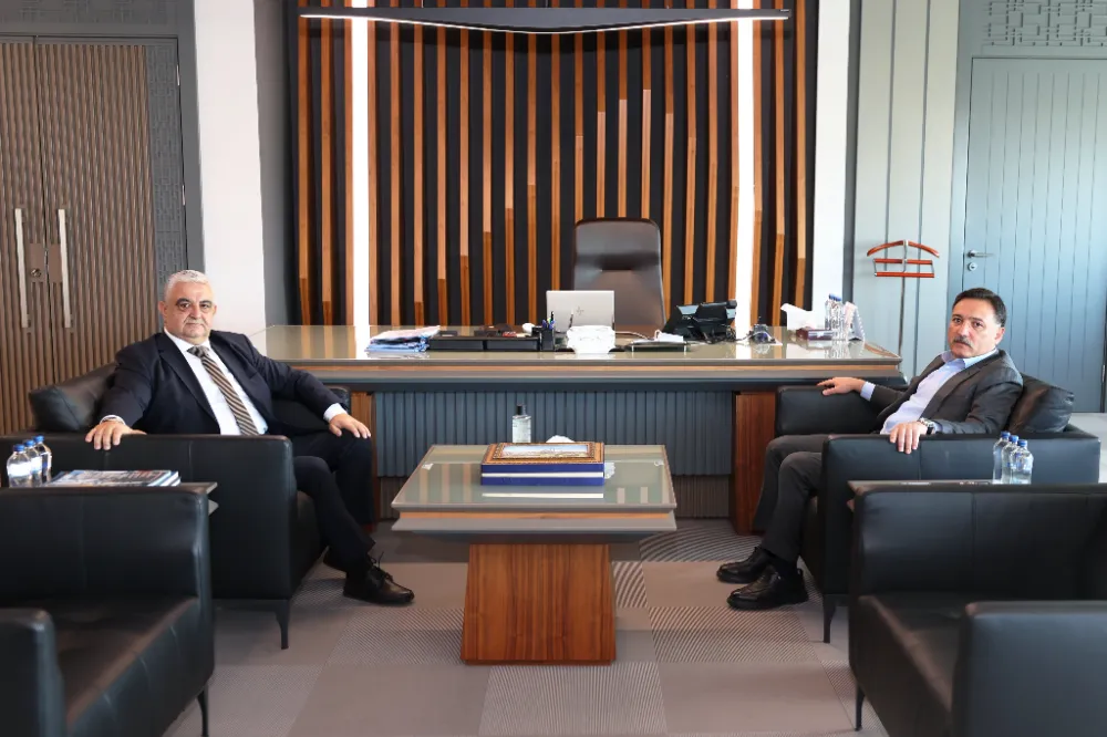 VALİ ÇİÇEK, ERCİYES ANADOLU HOLDİNG’İ ZİYARET ETTİ